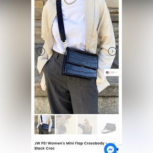 JW PEI woman’s black purse. Never used!